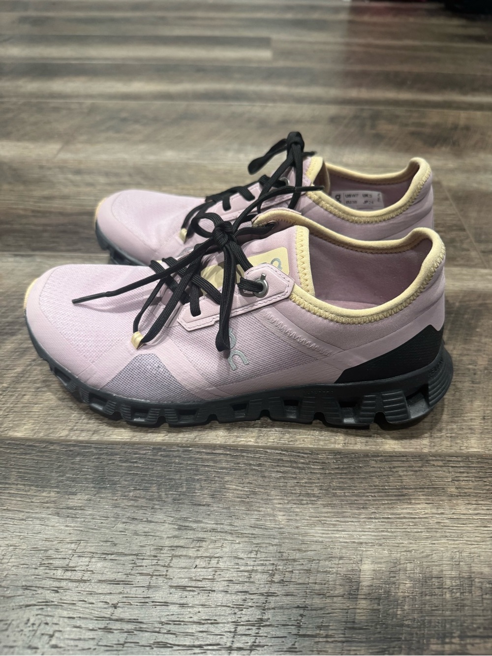 On Running Pink Trail Sneakers with Black Lug Outsole and Cream Trim